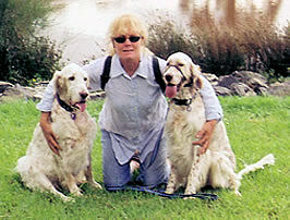 Beau with his halty on, with mum and Jessie